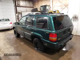 1997 Jeep Grand Cherokee Limited with VIN 1J4GZ78Y3VC733618, listed as a Copart auction lot 53757095 with 150,806 mi miles and Salvage title. Bid and sale history available at DreamBid. Image 2.