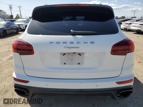 2016 Porsche Cayenne with VIN WP1AA2A20GKA12711, listed as a Copart auction lot 52104335 with 93,396 mi miles and Salvage Title. Bid and sale history available at carsss.com. Image 6.