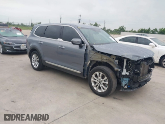 2022 Kia Telluride LX z VIN 5XYP2DHC5NG209265, wystawiony jako IAAI lot #42376957 z przebiegiem 51 615 mil mil oraz . Historia ofert i sprzedaży dostępna na DreamBid. Obrazek 1.