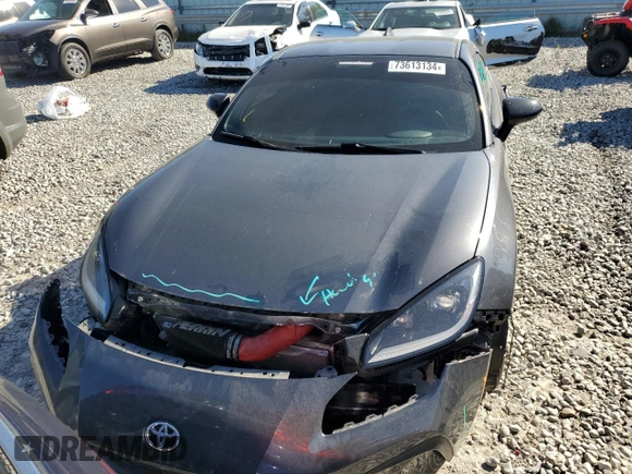 2023 Toyota GR86 with VIN JF1ZNBC13P8762569, listed as a Copart auction lot 73613134 with 16,634 mi miles and Salvage Title. Bid and sale history available at carsss.com. Image 5.