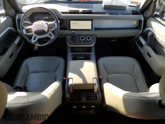 2023 Land Rover Defender S with VIN SALEJ6EX6P2147281, listed as a Copart auction lot 84217414 with 27,758 mi miles and Salvage title. Bid and sale history available at DreamBid. Image 8.