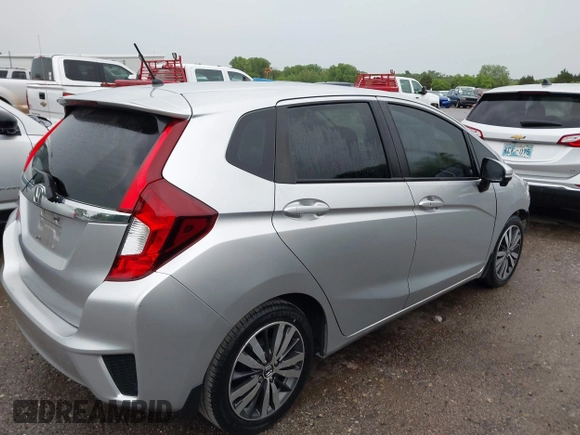 2016 Honda Fit EX with VIN JHMGK5H77GX022973, listed as a IAAI auction lot 42087380 with 96,439 mi miles and . Bid and sale history available at DreamBid. Image 13.