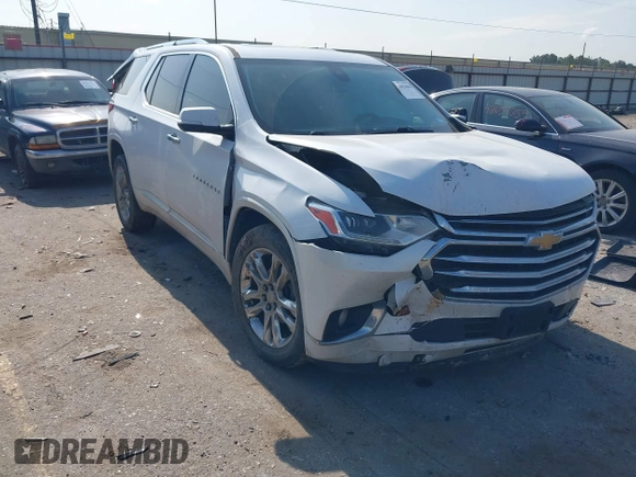 2020 Chevrolet Traverse High Country with VIN 1GNEVNKWXLJ135322, listed as a IAAI auction lot 42042466 with 105,748 mi miles and . Bid and sale history available at DreamBid. Image 1.