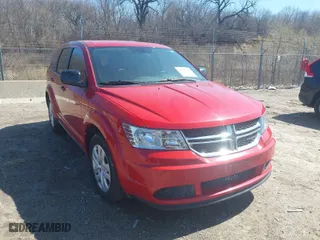 2014 Dodge Journey SE with VIN 3C4PDCAB7ET217009, listed as a IAAI auction lot 41991367 with 168,092 mi miles. Bid and sale history available at carsss.com. Image 1.