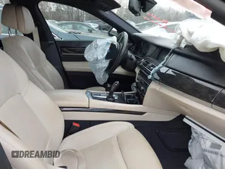 2014 BMW 7 Series 750i с VIN WBAYA8C55ED228448, выставлен на аукционе IAAI как лот 41350013 с пробегом 97 829 миль миль и . История ставок и продаж доступна на DreamBid. Изображение 5.