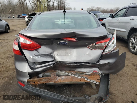 2013 Ford Focus S with VIN 1FADP3E22DL330158, listed as a Copart auction lot 52729135 with 113,624 mi miles and Salvage Title. Bid and sale history available at carsss.com. Image 6.