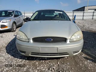 2005 Ford Taurus SE with VIN 1FAFP53U95A101336, listed as a Copart auction lot 56457095 with 127,656 mi miles and Salvage title. Bid and sale history available at DreamBid. Image 5.