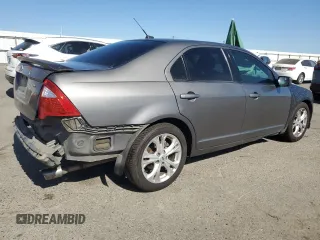 2012 Ford Fusion SE with VIN 3FAHP0HA1CR401191, listed as a Copart auction lot 61968675 with 177,018 mi miles and Salvage title. Bid and sale history available at DreamBid. Image 3.