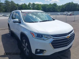 2021 Chevrolet Traverse LT with VIN 1GNERHKW9MJ151812, listed as a IAAI auction lot 42608579 with 80,491 mi miles and . Bid and sale history available at DreamBid. Image 1.