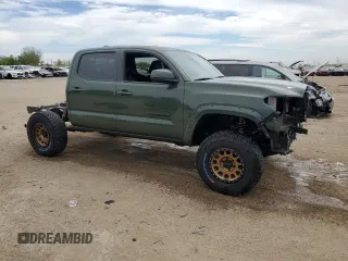 2022 Toyota Tacoma SR with VIN 3TMCZ5AN3NM511541, listed as a Copart auction lot 56299195 with 33,427 mi miles and Salvage title. Bid and sale history available at DreamBid. Image 4.