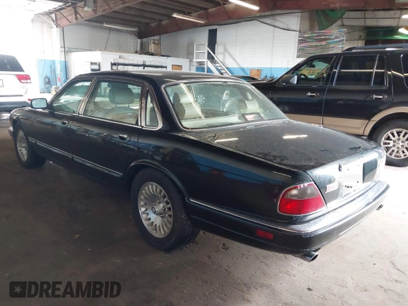 1997 Jaguar XJ Vanden Plas with VIN SAJKX6243VC800080, listed as a IAAI auction lot 42190859 with 192,979 mi miles and . Bid and sale history available at DreamBid. Image 3.