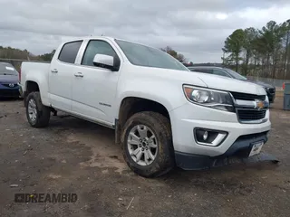 2018 Chevrolet Colorado 2WD LT z VIN 1GCGSCEN3J1143390, wystawiony jako IAAI lot #41719402 z przebiegiem 132 849 mil mil oraz . Historia ofert i sprzedaży dostępna na DreamBid. Obrazek 1.