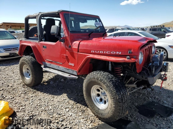 2003 Jeep Wrangler Rubicon with VIN 1J4FA69S93P352899, listed as a Copart auction lot 56054425 with 3,761 mi miles and Salvage title. Bid and sale history available at DreamBid. Image 4.