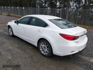 2016 Mazda Mazda6 i Sport with VIN JM1GJ1U52G1431967, listed as a IAAI auction lot 41602804 with 130,579 mi miles. Bid and sale history available at carsss.com. Image 3.