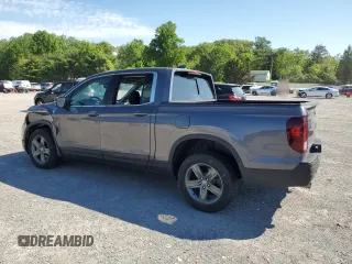 2021 Honda Ridgeline RTL z VIN 5FPYK3F50MB016439, wystawiony jako Copart lot #56114775 z przebiegiem 25 656 mil mil oraz Szkoda całkowita • Salvage title. Historia ofert i sprzedaży dostępna na DreamBid. Obrazek 2.