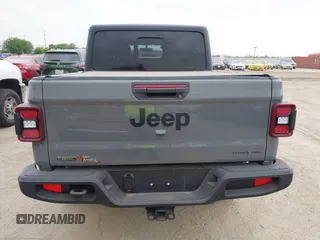 2022 Jeep Gladiator Willys with VIN 1C6JJTAMXNL137237, listed as a IAAI auction lot 41947651 with 55,199 mi miles and . Bid and sale history available at DreamBid. Image 16.