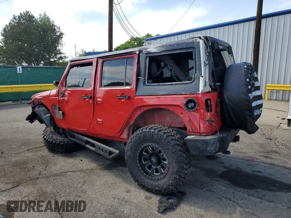 2014 Jeep Wrangler Unlimited Rubicon with VIN 1C4HJWFG5EL283881, listed as a Copart auction lot 58150255 with 100,166 mi miles and Non repairable. Bid and sale history available at DreamBid. Image 2.