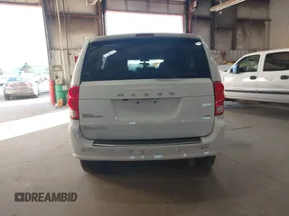 2017 Dodge Grand Caravan SE z VIN 2C4RDGBG6HR848612, wystawiony jako IAAI lot #38453498 z przebiegiem 56 964 mil mil oraz . Historia ofert i sprzedaży dostępna na DreamBid. Obrazek 15.