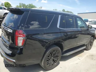 2021 Chevrolet Tahoe LT with VIN 1GNSKNKD4MR262628, listed as a Copart auction lot 54875235 with 90,533 mi miles and Salvage title. Bid and sale history available at DreamBid. Image 3.
