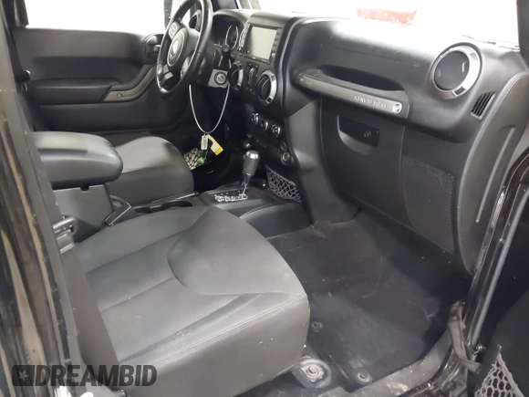 2017 Jeep Wrangler Unlimited Sport with VIN 1C4BJWDG6HL701149, listed as a IAAI auction lot 42678079 with 101,073 mi miles and . Bid and sale history available at DreamBid. Image 5.