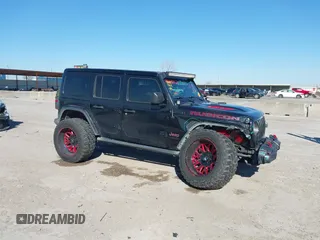 2018 Jeep Wrangler Unlimited Rubicon z VIN 1C4HJXFGXJW108766, wystawiony jako IAAI lot #41846062 z przebiegiem 96 791 mil mil oraz . Historia ofert i sprzedaży dostępna na DreamBid. Obrazek 14.
