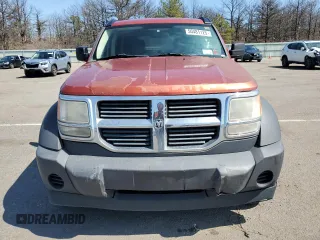 2007 Dodge Nitro SXT z VIN 1D8GU28K57W616726, wystawiony jako Copart lot #50481125 z przebiegiem 183 883 mil mil oraz Szkody całkowita. Historia ofert i sprzedaży dostępna na DreamBid. Obrazek 5.