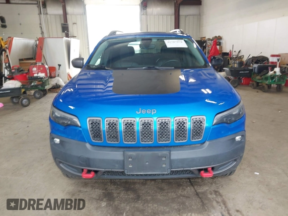 2019 Jeep Cherokee Trailhawk with VIN 1C4PJMBX0KD168097, listed as a IAAI auction lot 41787878 with 39,163 mi miles and . Bid and sale history available at DreamBid. Image 12.