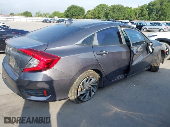 2017 Honda Civic EX z VIN 19XFC2F7XHE056273, wystawiony jako IAAI lot #42087934 z przebiegiem 95 871 mil mil oraz . Historia ofert i sprzedaży dostępna na DreamBid. Obrazek 4.