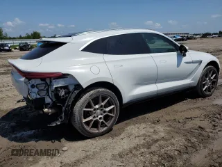 2021 Aston Martin DBX z VIN SCFVUJAW8MTV02781, wystawiony jako Copart lot #56249665 z przebiegiem 19 901 mil mil oraz Szkoda całkowita • Salvage title. Historia ofert i sprzedaży dostępna na DreamBid. Obrazek 3.