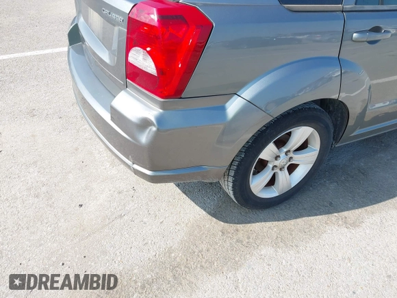 2012 Dodge Caliber SXT with VIN 1C3CDWDA3CD507614, listed as a IAAI auction lot 42107559 with 109,236 mi miles. Bid and sale history available at carsss.com. Image 6.