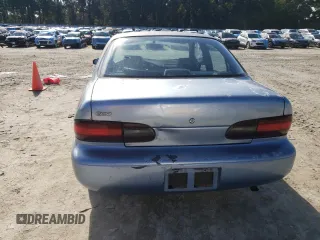 1996 Geo Prizm z VIN 1Y1SK526XTZ020379, wystawiony jako Copart lot #41657375 z przebiegiem 197 763 mil mil oraz Szkody całkowita. Historia ofert i sprzedaży dostępna na DreamBid. Obrazek 6.