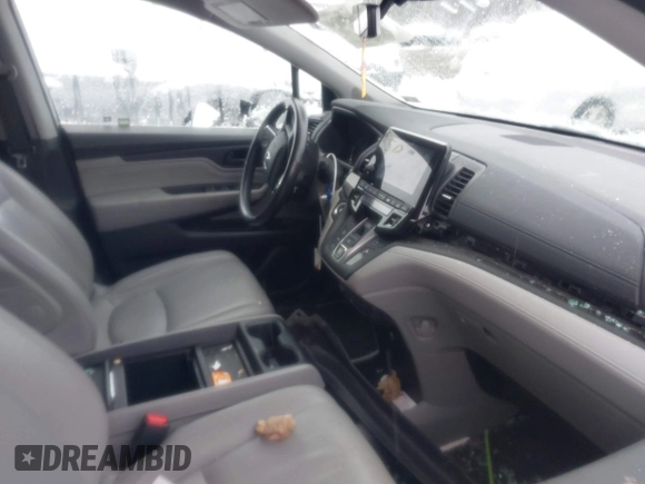 2018 Honda Odyssey Touring with VIN 5FNRL6H8XJB029570, listed as a IAAI auction lot 41485794 with 77,601 mi miles. Bid and sale history available at carsss.com. Image 5.