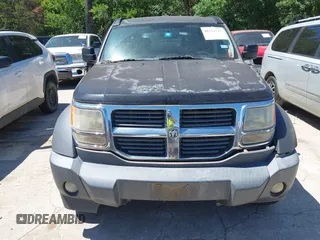2007 Dodge Nitro SXT z VIN 1D8GT28K57W689694, wystawiony jako IAAI lot #42311713 z przebiegiem 141 344 mil mil oraz . Historia ofert i sprzedaży dostępna na DreamBid. Obrazek 6.