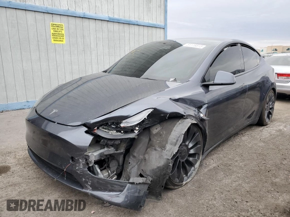2022 Tesla Model Y Performance with VIN 7SAYGDEF1NF491967, listed as a Copart auction lot 51119515 with 50,520 mi miles and Salvage title. Bid and sale history available at DreamBid. Image 1.