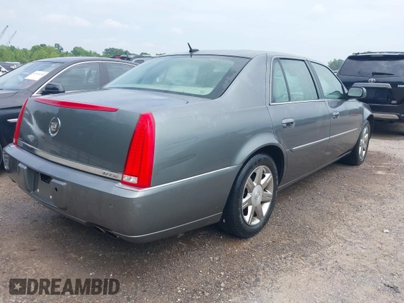 2006 Cadillac DTS 1SC z VIN 1G6KD57Y76U244707, wystawiony jako IAAI lot #42445115 z przebiegiem 189 119 mil mil oraz . Historia ofert i sprzedaży dostępna na DreamBid. Obrazek 4.
