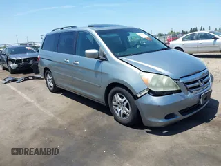 2005 Honda Odyssey EX-L z VIN 5FNRL38795B103475, wystawiony jako IAAI lot #42383843 z przebiegiem 230 996 mil mil oraz . Historia ofert i sprzedaży dostępna na DreamBid. Obrazek 1.
