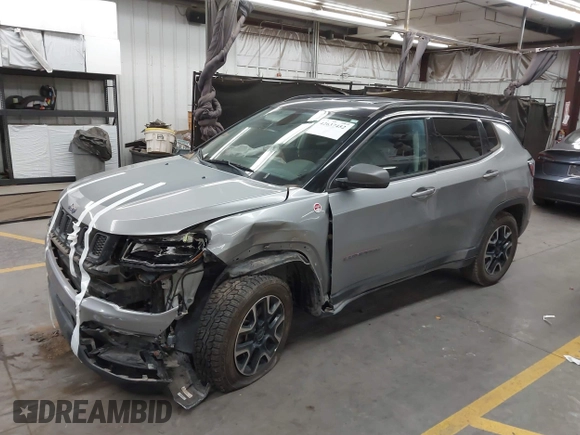 2020 Jeep Compass Trailhawk with VIN 3C4NJDDB7LT203447, listed as a IAAI auction lot 42637452 with 113,896 mi miles and . Bid and sale history available at DreamBid. Image 17.