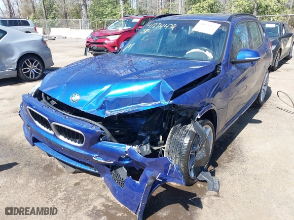 2015 BMW X1 sDrive28i with VIN WBAVM1C58FV314947, listed as a IAAI auction lot 41874472 with 128,271 mi miles. Bid and sale history available at carsss.com. Image 6.