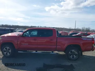 2016 Toyota Tacoma SR5 with VIN 3TMDZ5BN9GM012720, listed as a IAAI auction lot 41664651 with 119,010 mi miles and . Bid and sale history available at DreamBid. Image 14.