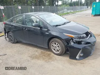 2021 Toyota Prius LE z VIN JTDKAMFP0M3179016, wystawiony jako IAAI lot #42204095 z przebiegiem 34 691 mil mil oraz . Historia ofert i sprzedaży dostępna na DreamBid. Obrazek 1.