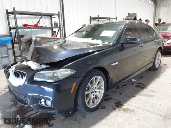 2014 BMW 5 Series 535i xDrive with VIN WBA5B3C58ED531825, listed as a IAAI auction lot 41715275 with 67,782 mi miles and . Bid and sale history available at carsss.com. Image 2.