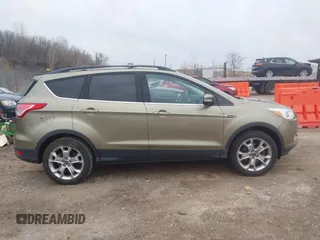 2013 Ford Escape SEL with VIN 1FMCU0HX9DUC77808, listed as a IAAI auction lot 41967998 with 71,196 mi miles. Bid and sale history available at carsss.com. Image 13.
