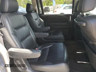 2006 Honda Odyssey Touring z VIN 5FNRL388X6B009356, wystawiony jako Copart lot #55991335 z przebiegiem 101 816 mil mil oraz Szkoda całkowita • Salvage title. Historia ofert i sprzedaży dostępna na DreamBid. Obrazek 10.