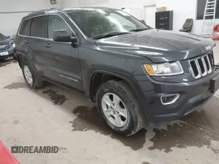 2014 Jeep Grand Cherokee Laredo with VIN 1C4RJFAG4EC186926, listed as a IAAI auction lot 41745168 with 128,519 mi miles. Bid and sale history available at carsss.com. Image 1.