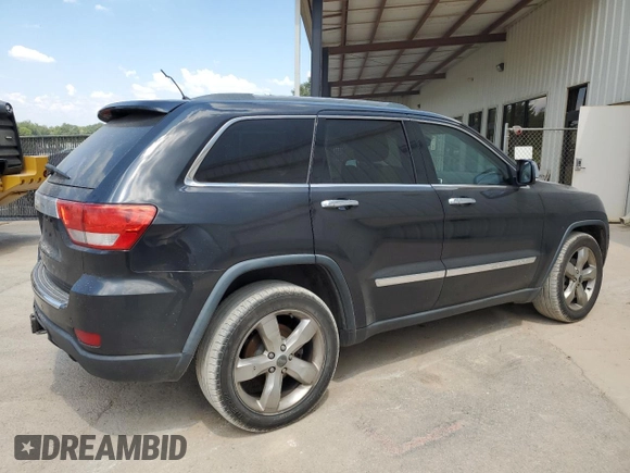 2013 Jeep Grand Cherokee Overland with VIN 1C4RJECT7DC526119, listed as a Copart auction lot 60735594 with 143,454 mi miles and Clean Title. Bid and sale history available at carsss.com. Image 3.