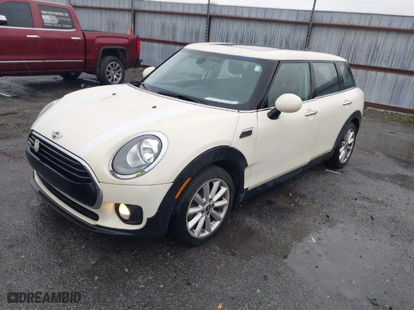 2016 MINI Cooper Clubman with VIN WMWLN5C59G2E30093, listed as a IAAI auction lot 41535638 with 89,224 mi miles. Bid and sale history available at carsss.com. Image 2.