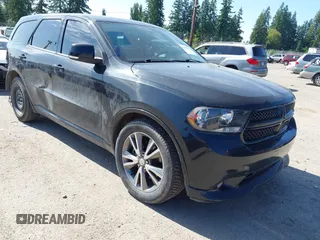 2013 Dodge Durango R/T z VIN 1C4SDJCT4DC669028, wystawiony jako IAAI lot #42477917 z przebiegiem 172 669 mil mil oraz . Historia ofert i sprzedaży dostępna na DreamBid. Obrazek 1.