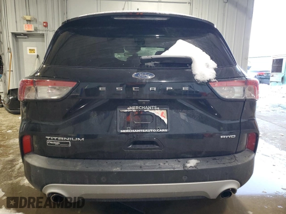 2021 Ford Escape Titanium with VIN 1FMCU9J91MUA57451, listed as a Copart auction lot 44678135 with 74,795 mi miles and Salvage title. Bid and sale history available at DreamBid. Image 6.
