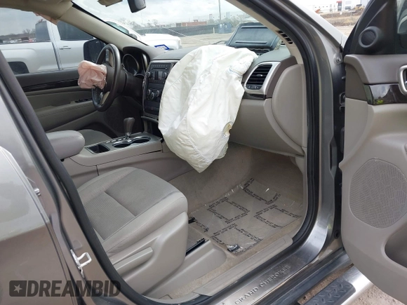 2013 Jeep Grand Cherokee Laredo with VIN 1C4RJEAG2DC571569, listed as a IAAI auction lot 41100518 with 98,265 mi miles. Bid and sale history available at carsss.com. Image 5.