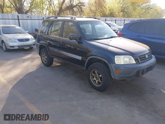 2000 Honda CR-V EX with VIN JHLRD1866YC025833, listed as a IAAI auction lot 42039440 with 238,599 mi miles. Bid and sale history available at carsss.com. Image 1.